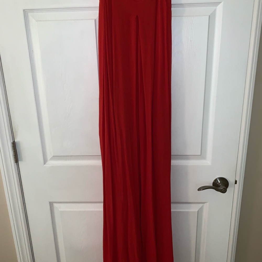 Red/Salmon colored jumpsuit